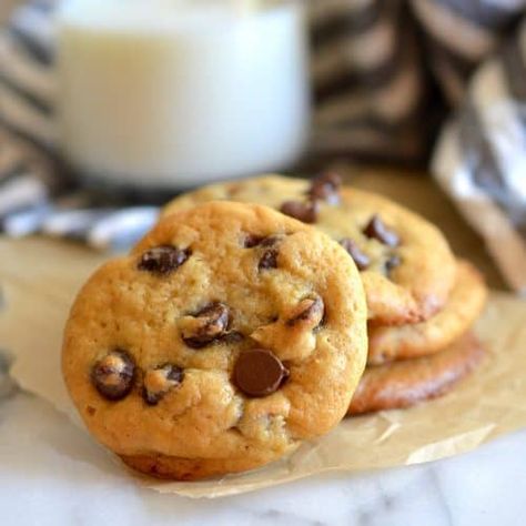 Stack of chocolate chip cookies on parchment paper with glass of milk in background. Easy Bowls, Chocolatechip Cookies, Greek Yogurt Cookies, Nestle Recipes, Greek Yogurt Chocolate, Yogurt Chocolate, Clean Desserts, Healthy Chocolate Chip Cookies, Healthy Greek Yogurt