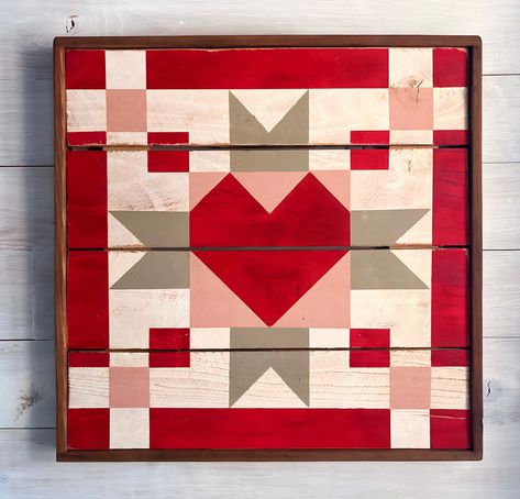 Our Cupid’s Arrow Barn Quilt is hand painted on reclaimed wood.  Framed in walnut and sealed for indoor or outdoor use. Custom colors from our Prairie Paint Collection are available upon request. Heart Barn Quilt Pattern, Quilt Wedding, Painted Quilt Blocks, Quilt Block Designs, Barn Quilt Patterns Meanings, Barn Quilts Patterns, Free Barn Quilt Patterns, Christmas Barn Quilts, Wood Quilt Block