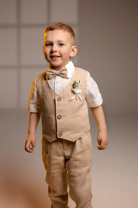 Linen ring bearer outfit: pants, vest, suspenders, bow tie and shirt. Boho Ring Bearer, Ring Bearer Vest, Fall Wedding Suits, Boys Ring, Ring Bearer Suit, Champagne Ring, Vacation Dresses Beach, Tan Suit, Bearer Outfit