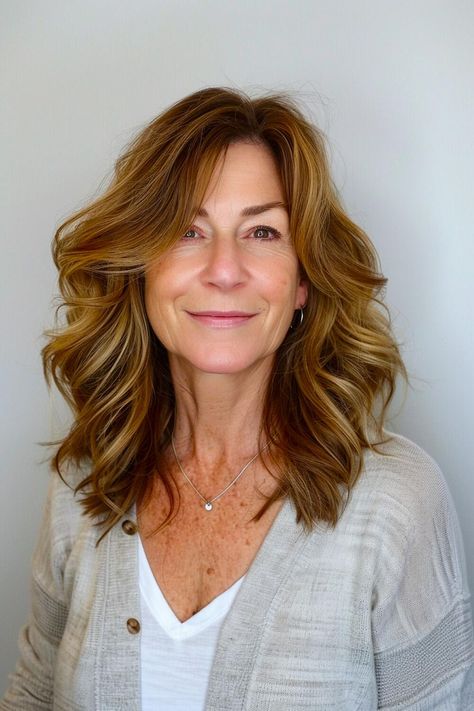 Medium-length cut with swoopy layers for women over 50 seeking a flattering haircut Voluminous Lob, Women In Their 50s, Haircut Idea, Flattering Haircuts, Gray Hair Color, Haircuts For Women Over 50, Great Haircuts, Classic Bob, Natural Gray Hair