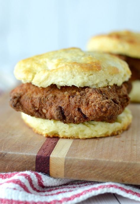 With homemade buttermilk biscuits and fried chicken soaked in pickle juice, this copycat Chick-fil-A chicken biscuit will leave you wanting more. #copycatchickfila #copycatchickfilachickenbiscuit #chickenbiscuit #buttermilkbiscuits #homemadebiscuits | www.chiselandfork.com Fried Chicken And Biscuits, Chicken Biscuits, Chicken Biscuit, Homemade Fried Chicken, Grandbaby Cakes, Copycat Chick Fil A, Cornish Hen, Red Pepper Jelly, Homemade Buttermilk Biscuits