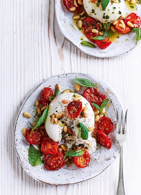 Serve up the taste of summer in this simple starter recipe for two made with oven-roasted tomatoes and a gorgeous ball of fresh, creamy burrata cheese. Simple Dinner Party, Burrata Recipe, Healthy Starters, Oven Roasted Tomatoes, Easy Starters, Starter Recipe, Basil Recipes, Burrata Cheese, Delicious Magazine