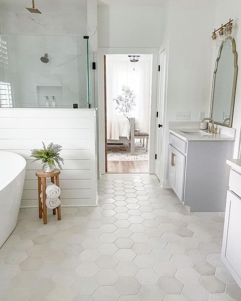 Loving how @thewhitehouseonpineridge used white marble white hexagon tiles in this stunning bathroom floor!⁣ ⁣ #masterbathroom⁣ #bathroomdesign⁣ #bathroomremodel⁣ White Hexagon Bathroom, Airy Bathroom, Hexagon Floor Tiles, Hexagon Tile Bathroom, White Hexagon Tiles, Hexagon Floor, All White Bathroom, Shiplap Bathroom, Shiplap Walls