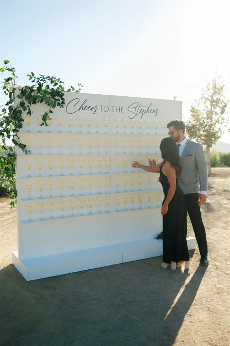 A glass of bubbly upon guest arrival? Yes, please! We loved this champagne welcome wall from Jordyn & Spencer's magical wedding day ✨ Wedding Planning & Design @taylordeckerevents Venue @crcranch_weddings Florals @haus.and.company Specialty Rentals @twoofakindrentals Specialty Signage & Installations @badercollective Wedding Signage @typejcreative #TaylorDeckerEvents #Wedding #Planning #TemeculaWedding #LocationWedding #WeddingPhotos #Champagnewall #WeddingInspo #WeddingStyles Champagne Seating Chart Wedding, Wedding Welcome Champagne, Champagne Welcome Wall, Champagne Seating Chart, Champagne Wall Wedding, Reception Theme, Save The Date Video, Welcome Wall, Wall Seating