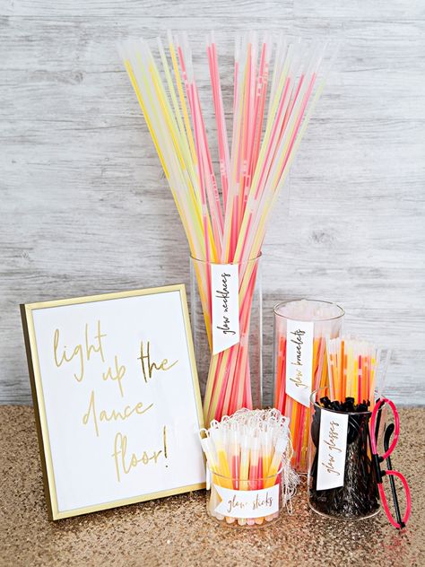 Check out this DIY wedding glow stick bar, so cute! Popsicle Wedding Ideas, Glow Stick Set Up Wedding, Glow Stick Display At Wedding, Light Up The Dance Floor Wedding, Light Sticks Wedding, Foam Glow Sticks Wedding Display, Wedding Glow Stick Display, Unique Wedding Ideas Creative Receptions, Brighton Wedding