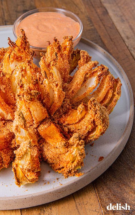 BlAir Fryer Blooming Onion Isn't Made For SharingDelish Air Fryer Blooming Onion, General Tao Chicken, Fried Onion Rings, Blooming Onion Recipes, Air Fryer Recipes Breakfast, Bloomin Onion, Blooming Onion, Air Fryer Oven Recipes, Air Fry Recipes