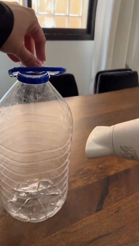 Im loving these organic shaped vases popping up everywhere. Every piece is so unique. And they seem DIYable! So heres how I made one! You'll need a large plastic bottle. I chose a 5 liter water bottle. You can choose smaller or bigger depending on the size of vase you want. Start heating the plastic bottle using a heating gun if you dont have a heating gun you can use a hair dryer on high heat like i did. As the bottle starts heating the plastic will start warping. Mold it any… Diy Large Vase How To Make, Textured Vase, Old Wall, Just Style, Bottle Vase, Plastic Bottle, Large Vase, Good Old, Hair Dryer