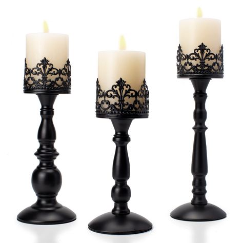 PRICES MAY VARY. Retro Design: Hollow crown candle holders can hold pillar candles and LED flameless Candles up to 3 inches. They are perfect table centerpieces and would adding a premium atmosphere to your home decor whether rustic farmhouse, modern, gothic or industrial. Smooth To The Touch: Iron candle stands adopt mature powder coating technology to make it rust-proof, smooth, without bumps, and can be kept for years and years Anti-scratch pad is attached to the bottom to protect your table. Candle Stands Decor, Tall Candle Stands, Gothic Candle Holder, Gothic Candle, Metal Candle Stand, Black Pillar Candles, Gothic Candles, Candle Table Centerpieces, Black Candle Holders