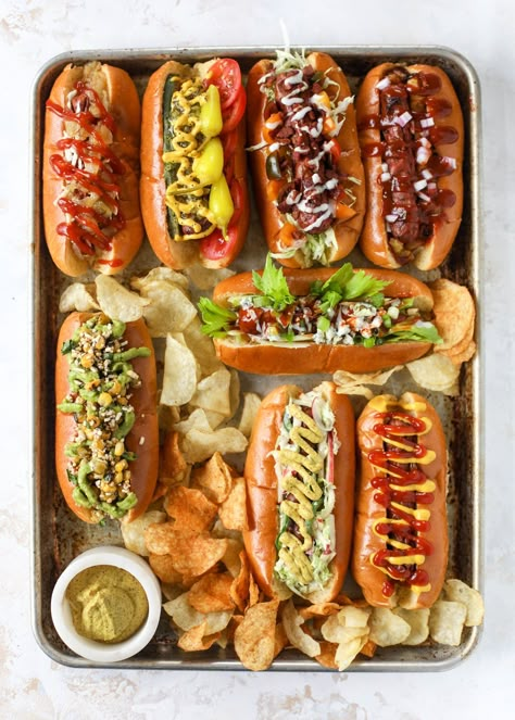 Nothing screams summer more than a hot dog bar! Grab your buns and dogs and a whole lot of toppings. This is super fun and delicious! Fancy Hot Dogs, Gourmet Hot Dogs, Hot Dog Bar, Big Appetite, Hot Dog Recipes, Burger Bar, Food Goals, Dog Recipes, Food Platters