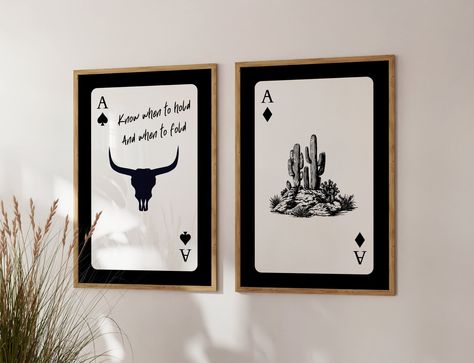 This set of 2 playing card wall art blends gothic and classic western for a truly stylish statement. Bull skull and desert cactus designs on abstract black playing cards, just the trendy addition you've been searching for! Printable wall art is an easy, affordable way to quickly showcase your unique decor style and transform your space. How it works: 🛒 Buy  ⬇️Download 🖨️Print  🖼️Hang After purchase, your download link will be sent instantly. Access your files in Etsy from a computer or laptop browser (note that you cannot download your files from the Etsy app). Etsy dashboard --> Your account --> Purchases --> Download. To print, download your files and print like any other photo - at home, a print shop, or an online print store (Shutterfly, Vista Print, Walgreens, Staples etc.). I reco His And Hers Decor, Western Gothic Decor, Vintage Gothic Home Decor, Trendy Gallery Wall, Playing Card Print, Cowgirl Wall Art, Gothic Poster, Western Gothic, Longhorn Bull