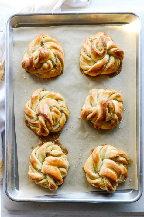 Swedish Cardamom Buns are soft, plush sweet rolls with a fragrant cardamom sugar filling. This easy knotted pastry is beyond delicious! #cardamomrolls #sweetrolls #cinnamonrolls #swedishrolls #christmas #christmasbreakfast #pastry Norwegian Cardamom Buns, Swedish Pastry Recipes, Cardamom Pastries, Cardamom Knots, Swedish Pastries, Swedish Pastry, Swedish Cardamom Buns Recipe, Swedish Cardamom Buns, Cardamom Recipes