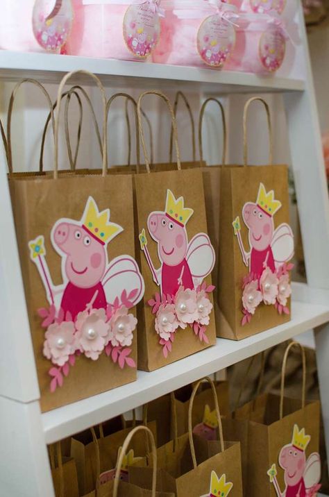 Annabelle’s Vintage Peppa Pig Adventure | CatchMyParty.com Pig Birthday Decorations, Peppa Pig Party Favors, Peppa Pig Birthday Party Ideas, Pig Birthday Party Ideas, Peppa Pig Birthday Decorations, Peppa Pig Party Decorations, Peppa Pig Birthday Party Decorations, Greta Gris, Peppa Pig Birthday Cake