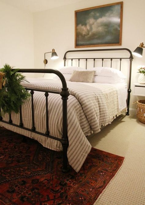 art + bedframe + rug Simple Made Bed, Organic Modern Bedroom Black Bed, How To Make A Guest Bed, Striped Duvet Bedroom, Iron Bed Frame Bedroom Decor, Striped Comforter Bedroom, Black Iron Bed Decor, Iron Bed Bedroom, Striped Bedding Bedroom