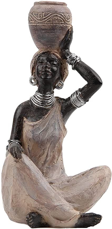 AFRICAN FIGURINES:This African statue measures 9.4”x4.7”x4.1”,the African lady figure is lifting a water tank with tranquil cross-legged pose.The measurement for water tank is 1.26”(diameter)/0.79”(depth).The African statues and sculptures is perfect for housewarming and will add a great addition to your African home decor. AFRICAN STATUES AND SCULPTURES:The African Figurines is crafted with professional sculpture,hand painting ... I may receive a commission from this link. African American Figurines, African Women Painting, African Figurines, African Pottery, African Inspired Decor, African Dolls, Afrikaanse Kunst, African Sculptures, African Home Decor