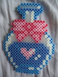 Adorable kawaii potion/bottle perler Love Potion No 9, Melt Beads Patterns, Easy Perler Bead Patterns, Perler Creations, Bead Creations, Melty Bead Patterns, Perler Ideas, Pearl Beads Pattern, Easy Perler Beads Ideas