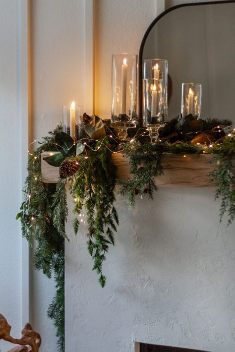 Chic Christmas Mantle Decor, Holiday Decor Mantle, Candles On Mantle For Christmas, Outside Home Christmas Decor, Christmas Mantle Village, Mantel Holiday Decorating Ideas, Decorating With Ornaments Ideas, Christmas Mantle With Tv Above Fireplace, Mantel Xmas Decorating Ideas