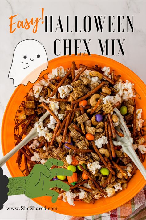 A large Halloween bowl filled with Halloween Chex Mix, a plastic skelleton hand inside on a white countertop Halloween Chow Chex Mix Recipe, Work Halloween Potluck Ideas, Monster Chex Mix Recipes, Popcorn Chex Mix Recipes, Halloween Trail Mix Recipe For Kids, Halloween Potluck Ideas For Work, Halloween Trail Mix Recipe, Halloween Chex Mix Recipes, Halloween Trail Mix