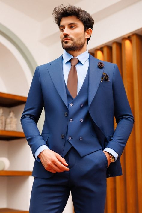 Our blue slim-fit suit 3-piece, a versatile outfit that seamlessly blends class and contemporary, is the height of polished style. A fully lined interior and perfect notch lapels on the single-breasted jacket provide a modern and sophisticated look for the fashion-forward man. #suit #suits #suitup #formalattire #menstyle #menfashion #gentleman #dapperlook #formalwear #fashioninspo #bluesuit Terracotta Suit, Three Piece Suit Wedding, Blazer Waistcoat, Blue Slim Fit Suit, Blue Three Piece Suit, Groom And Groomsmen Suits, Suit Groom, Groomsmen Suits, Slim Fit Suits