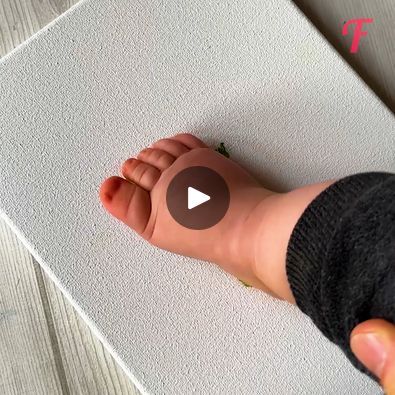 Baby's footprint turned into a work of art | DIY project to capture cherished memories | By Fabiosa DailyFacebook Diy Baby Footprint Art, Baby Footprint Art Ideas, Thumb Print Art, Baby Footprint Crafts, Baby Handprint Crafts, Baby Footprint Art, Baby Handprint, Baby Footprint, Thumb Prints