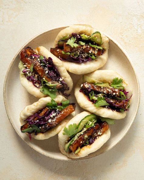 Filled with glazed sticky tofu, crisp veg and crunchy peanuts, these soft and fluffy vegan bao buns are comforting, hearty and fresh all at the same time. Grab our recipe here. Tofu Bao Buns, Vegan Bao Buns, Tofu Bao, Vegan Bao, Bao Buns Recipe, Pb Recipes, Sticky Tofu, Vegetarian Asian, Meatless Recipes