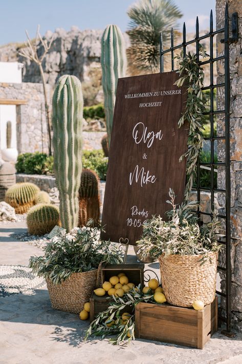 “Ethereal Mediterranean” Wedding Theme. Ceremony: Villa Vigli. Reception: AF. Lindia. Lindos Rhodes Island Greece. Colors: White, Yellow & shades of Green. Greek Destination Wedding Planned by Golden Apple Weddings. Bride & Groom Wedding Portraits. Couple’s Wedding Photoshoot #weddingtheme #weddingdecor #weddingevent #weddingphotography #weddingplanning #destinationweddings #Greece #Rhodes #island #Lindos #welcomearea #welcomesign #wooden #crates #rattanbaskets #oliveleaves #lemons #synthesis Greek Vineyard Wedding, Apple Green Wedding Theme, Colorful Mediterranean Wedding, Greek Wedding Reception, Meditterean Wedding, Mediteranian Wedding, Olive Decoration Wedding, Dolce Vita Wedding Theme, Medditeranean Wedding