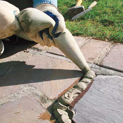 Driveway Repair, Flagstone Walkway, Walkway Landscaping, Natural Bristle Brush, Brick Walkway, Stone Walkway, This Old House, Paving Stones, Sponge Cleaning