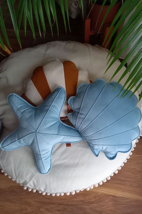 We present our handmade sea cushions: starfish and shells. We present our handmade sea cushions. With these pillows you can decorate your living room, bedroom, children's room, balcony, terrace, corridor or entryroom. You will give sea style to every interior in your house. Put them on the bed, on the sofa, on the couch. Build a sea fort with your kids. Perfect idea for marine nautical theme nursery room decor for toddlers girls for baby boys. Check out our large floor pillow too :) Thank you! Unique Bed Pillows, Mermaid Pillow Diy, Sea Room Ideas, Sea Theme Room, Under The Sea Room, Marine Decoration, Sea Kids Room, Stitch Room, Nautical Theme Nursery