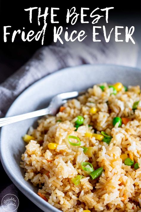 This Easy Takeaway Style Fried Rice is ready in 15 minutes and makes the perfect weeknight meal. Fried Rice is a staple part of every Chinese takeout. But have you made it at home and been sadly disappointed? Either the rice is stuck together, or the flavor is not there. With this recipe, you can master Takeout Style Cantonese Fried Rice at home. This is better than takeout fried rice! This is the BEST fried rice! Chinese Takeout Fried Rice, Best Chinese Fried Rice, Perfect Fried Rice, Chinese Special Fried Rice, Cantonese Rice Recipe, Special Fried Rice Recipe Chinese, Korean Fried Rice Recipe, Cantonese Fried Rice, Korean Fried Rice