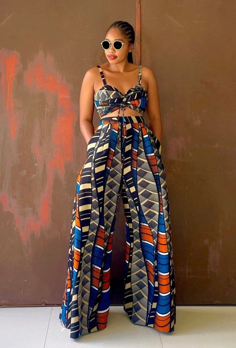 This beautifully made with love African print pant set will make you look great and be complimented in any event you want to wear it to.  ABOUT SIZING: *  Comes in different sizes.  * For more perfect fit, please use the measurement guide/sample to measure and send us the following: @Bust @Waist @Hip  @Thigh @knee @Jumpsuit length  Kindly let us know how tall you are to enable us determine a perfect shirt and pant length for you. ORDERING PROCESS: * Please swipe left of the product/outfit pictur Traditional Pants, Sewing Outfits For Women, Kitenge Jumpsuits For Women, Kitenge Pants, Ankara Outfits, African Pants Suit, African Outfits For Women, African Pants, African Print Pants