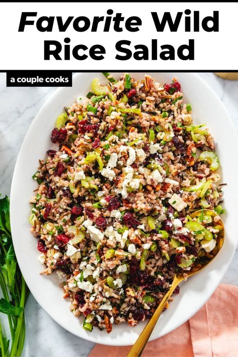 This wild rice salad recipe is simple and bursting with flavor, with crunchy veggies, pecans, cranberries, a zingy dressing, and feta cheese! #wildrice #wildricesalad #wildricesaladrecipe #wildricerecipe #sidedish #saladrecipe #easysalad #thanksgiving #thanksgivingsidedish #easysidedish Wild Rice Salad With Cranberries And Pecans, Wild Rice Cranberry Salad, Wild Rice Salads, Wild Rice Dishes, Simple Thanksgiving Salad, Wild Rice Salad Recipe Cold, Wildrice Sidedish, Crunchy Rice Salad, Recipes With Wild Rice