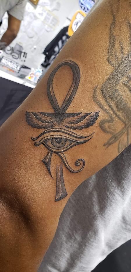 180+ Excellent Ankh Tattoo Designs with Meanings (2022) - TattoosBoyGirl The Ankh Tattoo, Tattoo Eye Of Horus, Black Activist, Eye Of Horus Tattoo, Egyptian Eye Tattoos, Ankh Tattoo, Horus Tattoo, Tattoo Eye, Egyptian Tattoo Sleeve