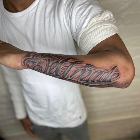 Inner Forearm Name Tattoo Men, Forearm Tattoo Men Name, Arm Tattoo Men Writing, Last Name Arm Tattoo, Side Forearm Tattoos Men, Forearm Tattoo Writing, Blessed Tattoo For Men Forearm, Cursive Forearm Tattoo Men, Mom Name Tattoo For Men Forearm