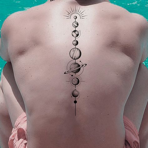 Tattoo planets | 99designs Universe Back Tattoo, Solar System Tattoo, Key Tattoo, Ancient Tattoo, Planet Tattoos, Spine Tattoo, Cool Small Tattoos, Best Book Covers, Spine Tattoos