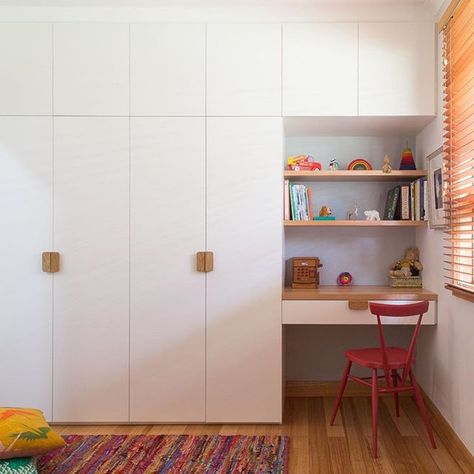 A simple, small-space, gender neutral kids room where storage and furnishings are built in and to the ceiling with red desk chair from @temperaturedesign and floor cushions from @tombo. Another warm and friendly spot in our #collingwoodcompactproject  #Regram via @braveneweco Kids Room Wardrobe Design, Space Gender, Room Wardrobe Design, Bedroom Storage For Small Rooms, Gender Neutral Kids Room, Neutral Kids Room, Red Desk, Bedroom Cupboard, Bedroom Cupboard Designs