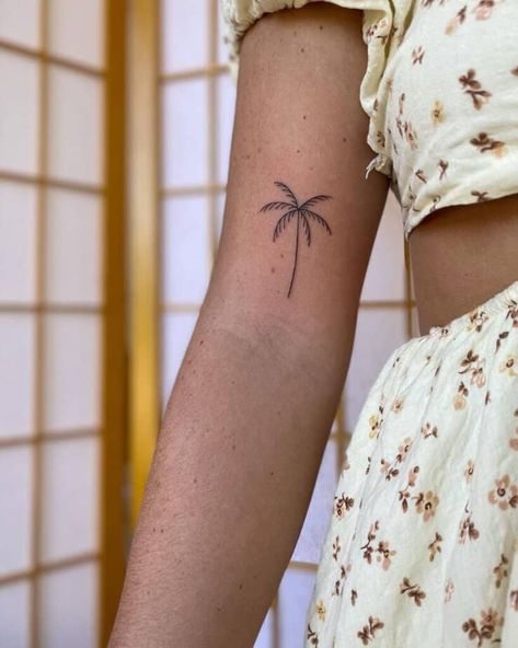 1. A fine-line palm tree tattoo Strand Tattoo, Tree Sleeve Tattoo, Tree Tattoo Arm, Tree Tattoo Back, Twin Tattoos, Scene Tattoo, Small Palm Trees, Tree Tattoo Small, Palm Tattoos