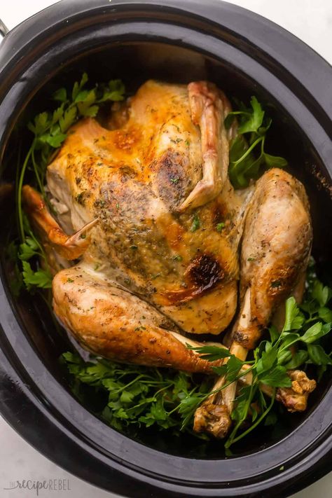 Crockpot Turkey with Garlic Butter is my go-to method for cooking a whole turkey! This is the easiest way you'll ever prepare the whole bird and it always turns out juicy, tender, and flavorful as can be with all of that garlic butter. It's fail-proof! #crockpot #slowcooker #turkey | holiday meals | christmas dinner | thanksgiving dinner | dinner ideas | crockpot meals | slow cooker turkey | how to cook a whole turkey Slow Cooker Thanksgiving Turkey, How To Cook A Turkey In The Crockpot, Slow Cooker Turkey Breast Bone In Recipes, Slow Cooker Bone-in Turkey Breast, Cooking A Turkey In A Crock Pot, Crock Pot Whole Turkey, Small Turkey In Crockpot, Keeping Turkey Warm In Crockpot, Cooking Turkey In Crockpot