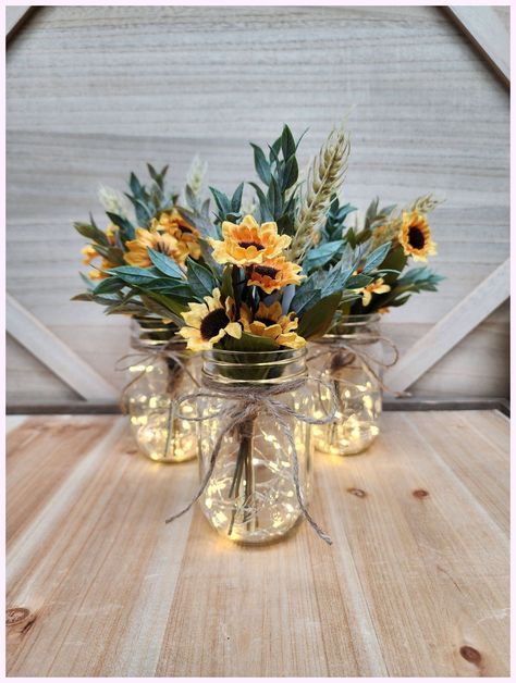 [Promotion] 'Fall Is In The Air! Choose Lighted Or Unlighted. These Beautiful Pint Sized Mason Jar Centerpieces Are Perfect For Your Next Event. They Are Very Popular For Weddings, Baby Showers, Parties, Corporate Events, Holiday Events, And Any Other Event That Requires Table Centerpieces. They Also Look Great In Any Room Of Your House Or Office. To See Other Lighted Jar Options And All Of My Other Listings, Please View My Shop: #masonjarfallcenterpiecesparty Mason Jars With Lights, Jar Centerpiece Wedding, Western Themed Wedding, Mason Jar Centerpiece, Fall Mason Jars, Graduation Tables, Sunflower Themed Wedding, Jar Centerpieces, Centerpiece Table