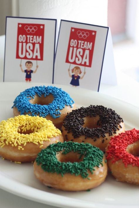 Olympic Games Donuts + Free Printables | CatchMyParty.com Olympic Breakfast Ideas, Olympic Games Party Food, Olympics Party Theme, Olympic Games Decorations, Olympics Birthday Party For Kids, Kids Olympics Party, Olympic Snacks For Kids, Olympic Birthday Party For Kids, Paris Olympics Party