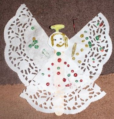 Doilies make pretty angel wings and skirts. We cut a triangular section from a doily, and used this piece as the angel’s skirt, while the rest of the doily was turned upside down and became t… Paper Doily Crafts Christmas, Doily Angels, Kids Church Christmas, Paper Doily Crafts, Kindergarten Christmas Crafts, Childrens Christmas Crafts, Tongue Depressors, Kindergarten Christmas, Sabbath School