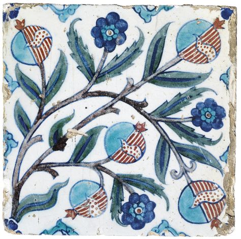 AN IZNIK POTTERY TILE OTTOMAN TURKISH,CIRCA 1640 The square tile with white ground painted in manganese, turquoise, cobalt-blue, bole-red and green with scrolling vine sprouting flowerheads, leaves and blue and red pomegranates, chips in the glaze, particularly around the edges Azulejos Tiles, Iznik Tile, Beautiful Tiles, Turkish Tile, Turkish Tiles, Antique Tiles, Turkish Ceramics, Pottery Jug, Red Pomegranate