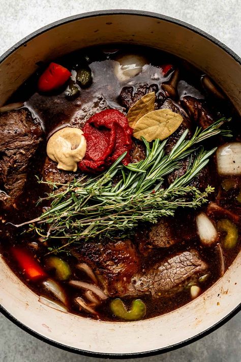 You don't need an expensive cut of beef to make a restaurant-worthy meal – this Red Wine Braised Beef recipe is proof! Slowly simmer beef chuck roast with red wine, vegetables, & herbs until it transforms into a succulent centerpiece complete with a built-in red wine sauce. Serve with creamy mashed potatoes for the best cozy dinner! (Slow cooker/Crockpot & Instant Pot directions provided.) #redwinebraisedbeef #redwinebeefroast #braisedbeef ##braisedbeefroast #beefroast #beefrecipes #dinnerideas Boston Beef Roast Recipes, Roast Beef With Red Wine Gravy, Red Wine Beef Roast, Roast With Red Wine, Red Wine Braised Beef, Wine Braised Beef, Chuck Roast Crock Pot Recipes, Dinner Slow Cooker, Braised Beef Recipes