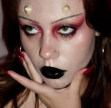 Red makeup, black lips, Halloween makeup, devils makeup, makeup inspiration, makeup artist, makeup ideas, creative makeup Red Eyeshadow Halloween, Sultry Red Makeup, Vampire Red Makeup, Red Creative Makeup, Dark Red And Black Makeup, Stolas Makeup, Black And Red Eyeshadow Looks, Red Vampire Makeup, Devils Makeup