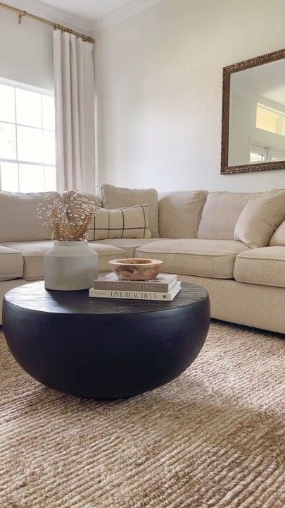 Coffee Table Decor Dark Wood, Modern Coffee Tables Black, Decorate Black Coffee Table, Black Coffee Table Decor Living Room, How To Style Ottoman Coffee Table, Round Black Wood Coffee Table, Styling Black Coffee Table, Round Solid Wood Coffee Table, Dark Round Coffee Table