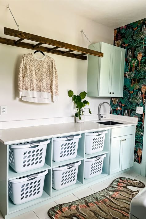 I have been giving my laundry room a much-needed DIY makeover these past few weeks and, friends, it’s time for the big reveal! I’m sharing the entire before and after, including our makeover wallpaper and all of the finer details! This consisted of rehanging the upper cabinets, reattaching cabinet doors, building an open shelf, cleaning, and accessorizing. #laundryroom #laundryroommakeover #wallpaper #homedecor Diy Laundry Room Makeover, Laundry Room Decor Ideas, Laundry Room Organization Ideas, Laundy Room, Laundry Room Update, Laundry Room Hacks, Room Organization Ideas, Rv Dreams, Laundry Room Wallpaper