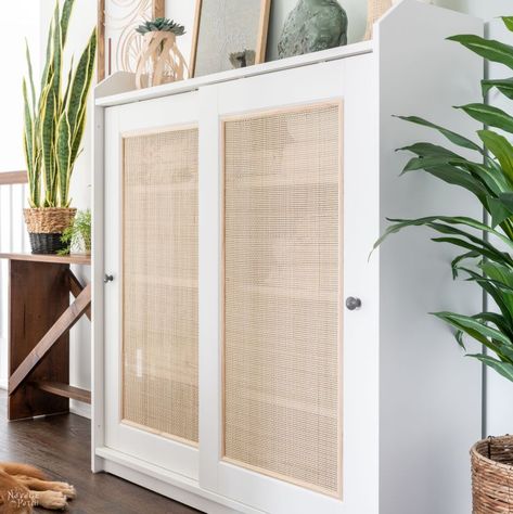 DIY Cane Cabinet (IKEA Hack) | How to make cane doors | IKEA Hauga hack | How to stretch cane | How to apply cane to glass doors | Cane door DIY | Cane weave doors | Radio weave cane webbing | #TheNavagePatch | TheNavagePatch.com Diy Cane Kitchen Cabinet Door, Hauga Hack Ikea, Ikea Cane Cabinet, Diy Cane Doors, Ikea Cabinet Door Hack, Add Cane To Cabinet, Diy Cane Cabinet Door, Upscaling Ideas, Cane Door Cabinet