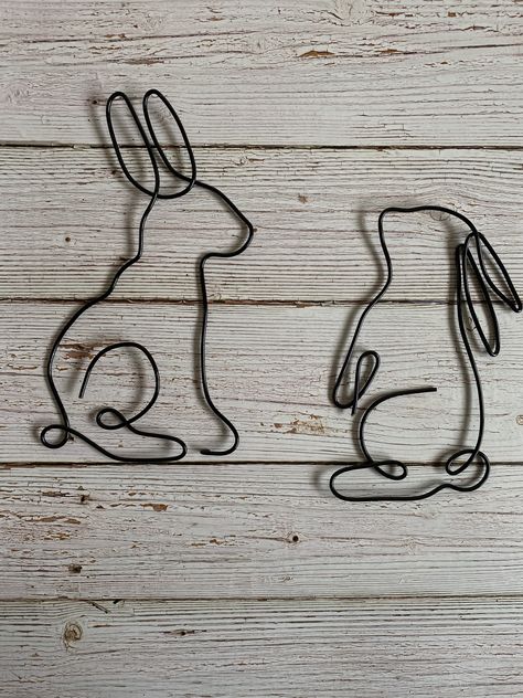 Wire bunnies • Wire wall decor • Home decor • Pet gifts • Pet lovers • Animal lovers Wire Bunny, Wire Wall Decor, Abc Crafts, Wire Words, Wire Jig, Rabbit Garden, Wire Art Sculpture, Copper Crafts, French Knitting