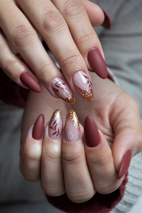 Embrace the beauty of autumn with these stunning fall nail ideas that feature delicate maple leaves dusted with shimmering glitter. The warm hues of red, orange, and gold mimic the vibrant foliage outside, while the glitter adds a magical touch that makes your nails truly pop. Perfect for cozy gatherings or a day out, these nails are sure to turn heads! Try this look and let your nails celebrate the season! Diwali Inspired Nails, Autumnal Nails 2024, Red Fall Nails Ideas, Fall Acrylic Nails Almond, Autumn Leaves Nails, Brown Nails For Fall, Diwali Nails, Nails With Leaves, Brown Nail Ideas