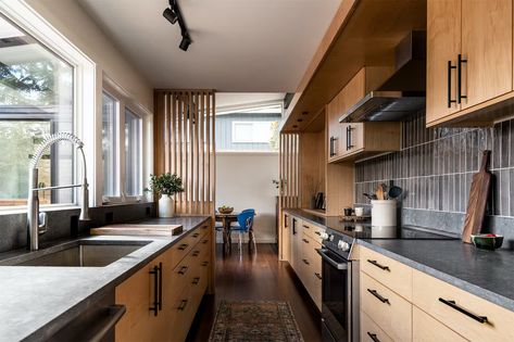 Photo 4 of 8 in This Revamped Seattle Midcentury Is a “Riff on the Original Melody” - Dwell Kitchen Dark, Hardwood Floors Dark, Dark Hardwood, Concrete Counter, Walnut Cabinets, Modern Architects, Galley Kitchen, Spacious Kitchens, Kitchen Photos