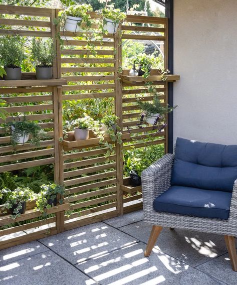 Balcony privacy ideas: 9 ways to screen it from view | Garden Wall Planter, Outdoor Garden Storage, Taman Air, Garden Privacy Screen, Balcony Privacy, Patio Privacy, Vertical Garden Wall, Garden Privacy, Balcony Plants