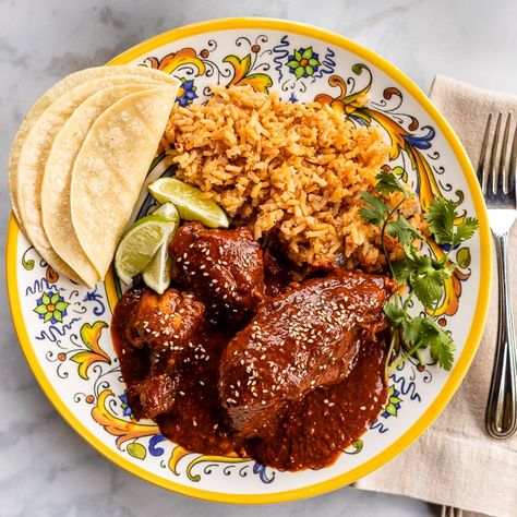 This authentic chicken mole recipe has a rich, complex flavor. It's a Mexican delicacy with hints of chocolate, nuts, and roasted peppers. Mexican Chicken Mole, Chicken Mole Recipe, Mexican Mole, Mole Recipe, Chicken Mole, Mole Sauce, Braised Chicken, Quick Chicken, Grilling Chicken Breast